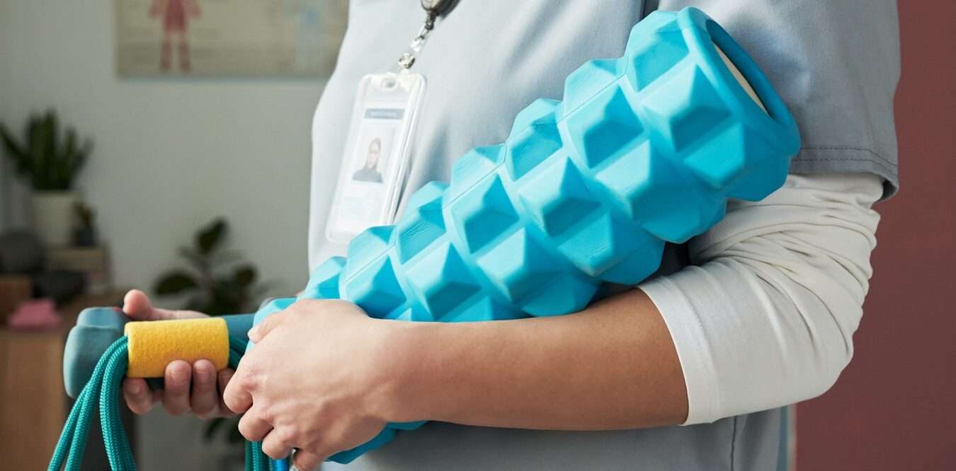 Healthcare Professional Holding Rehabilitation Equipment